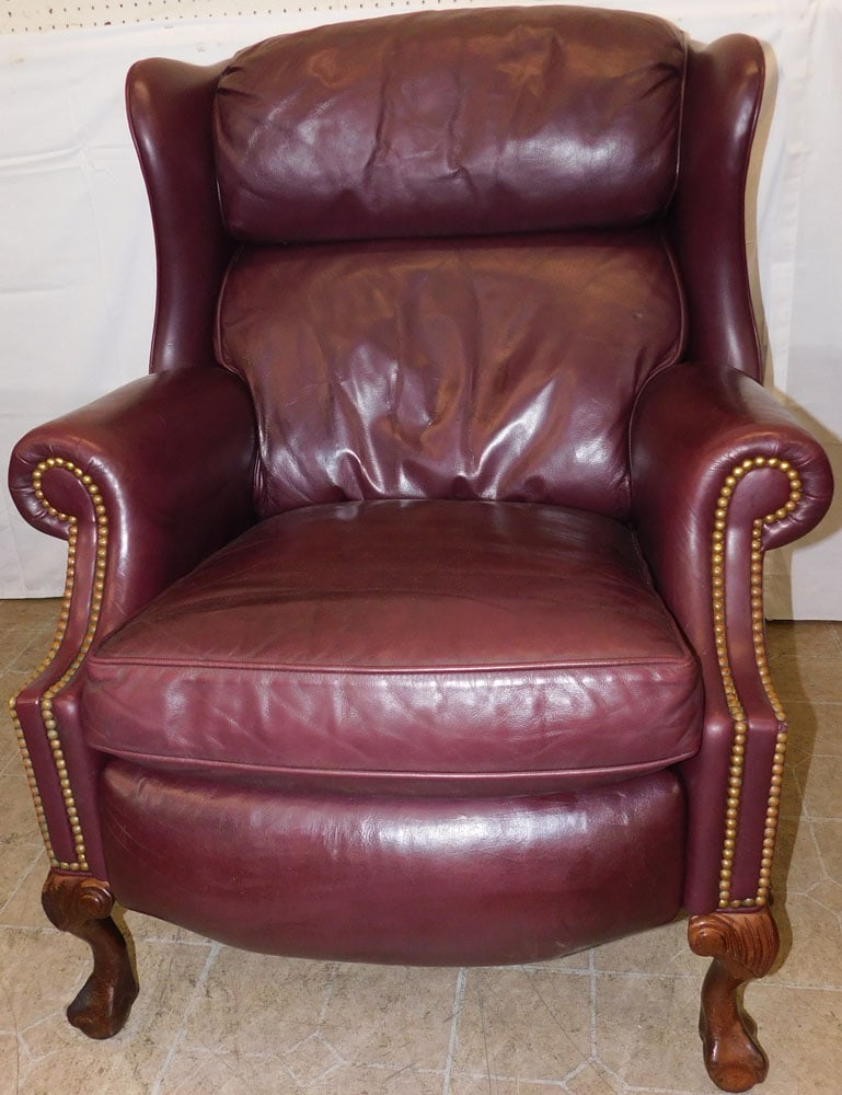 Leather Upholstered Recliner by Hancock & Moore: Leather Upholstered Recliner by Hancock & Moore . 41 1/4" H 23 1/2" W 35" D ALL DESCRIPTIONS AND ANY CONDITION STATEMENT GIVEN BY LANGSTON AUCTION GALLERY ARE STRICTLY OPINIONS AND LANGSTON'S SHALL HA