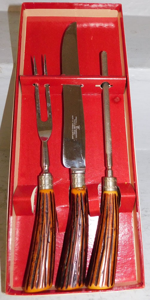 Three Piece Horn Handle Carving Set: Three Piece Horn Handle Carving Set . 12 3/4" L ALL DESCRIPTIONS AND ANY CONDITION STATEMENT GIVEN BY LANGSTON AUCTION GALLERY ARE STRICTLY OPINIONS AND LANGSTON'S SHALL HAVE NO RESPONSIBILITY FOR