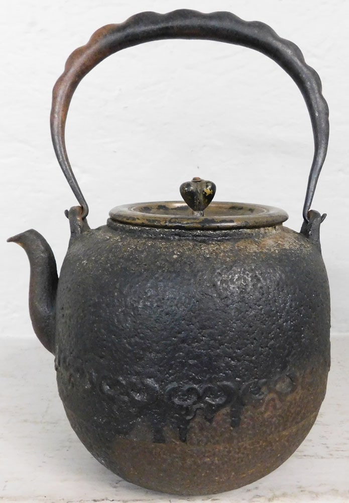 Antique Cast Iron Teapot with Bronze Lid Signed with Character Marks: Antique Cast Iron Teapot with Bronze Lid Signed with Character Marks . 7 1/2" H 7" Dia. ALL DESCRIPTIONS AND ANY CONDITION STATEMENT GIVEN BY LANGSTON AUCTION GALLERY ARE STRICTLY OPINIONS AND LANGSTO