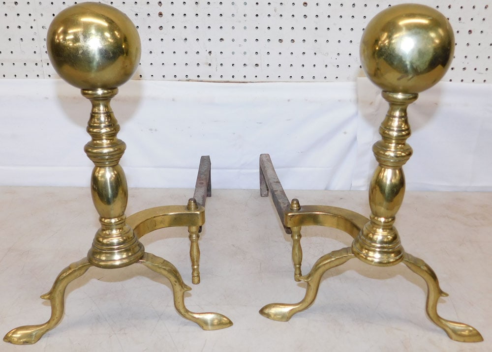 Pair of Antique Brass Cannonball Andirons: Pair of Antique Brass Cannonball Andirons . 15 1/2" H 11" W 19 3/4" D ALL DESCRIPTIONS AND ANY CONDITION STATEMENT GIVEN BY LANGSTON AUCTION GALLERY ARE STRICTLY OPINIONS AND LANGSTON'S SHALL HAVE NO 