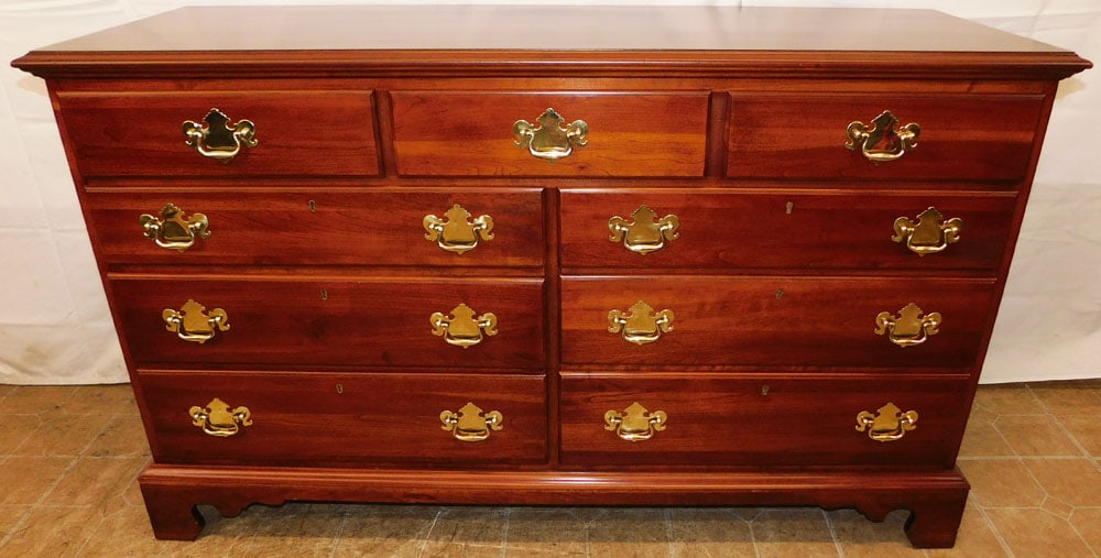 Cherry Nine Drawer Dresser by Link Taylor: Cherry Nine Drawer Dresser by Link Taylor . 34 1/4" H 57" W 19 3/4" D ALL DESCRIPTIONS AND ANY CONDITION STATEMENT GIVEN BY LANGSTON AUCTION GALLERY ARE STRICTLY OPINIONS AND LANGSTON'S SHALL HAVE NO 
