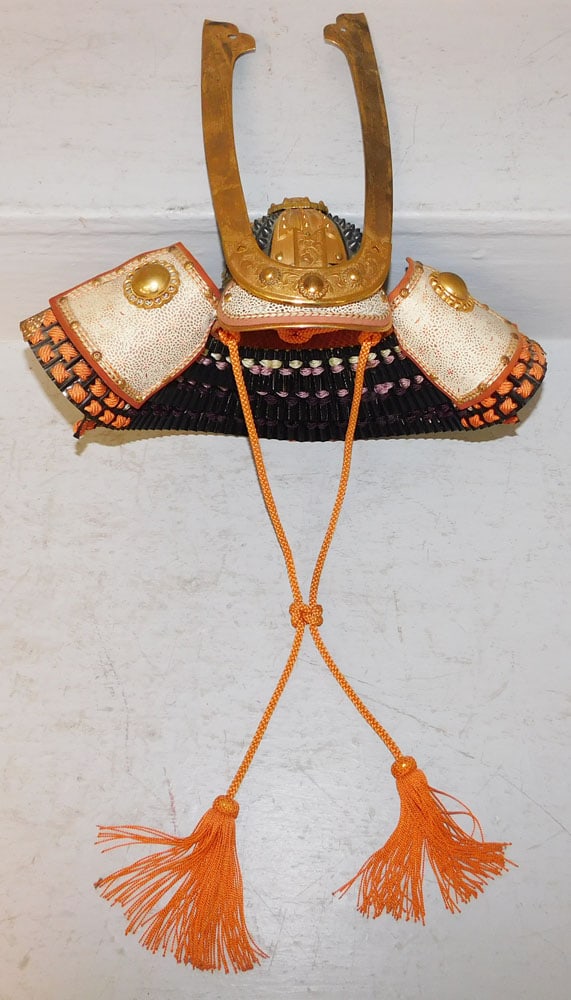 Brass & Metal Decorated Samurai Warrior Helmet: Brass & Metal Decorated Samurai Warrior Helmet. 13 1/2" H 13" W ALL DESCRIPTIONS AND ANY CONDITION STATEMENT GIVEN BY LANGSTON AUCTION GALLERY ARE STRICTLY OPINIONS AND LANGSTON'S SHALL HAVE NO