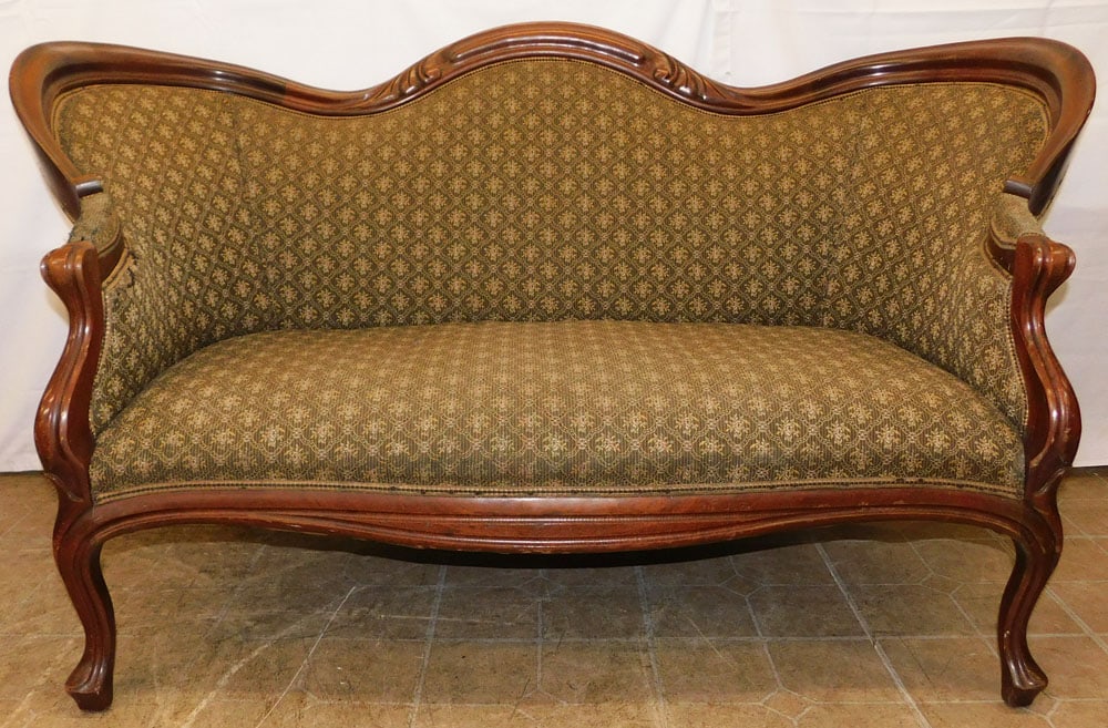 Mahogany Victorian Style Loveseat: Mahogany Victorian Style Loveseat. 32" H 59" W 28" D ALL DESCRIPTIONS AND ANY CONDITION STATEMENT GIVEN BY LANGSTON AUCTION GALLERY ARE STRICTLY OPINIONS AND LANGSTON'S SHALL HAVE NO RESPONSIBILITY