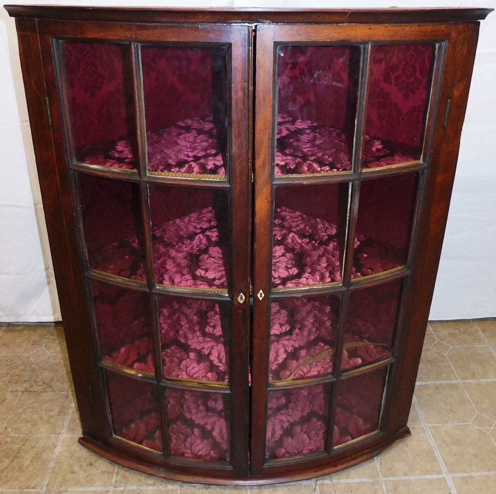 19th Century Mahogany Glass Door Bow Front Hanging Corner Cabinet: 19th Century Mahogany Glass Door Bow Front Hanging Corner Cabinet. 38 3/4" H 32" W 21" D ALL DESCRIPTIONS AND ANY CONDITION STATEMENT GIVEN BY LANGSTON AUCTION GALLERY ARE STRICTLY OPINIONS AND