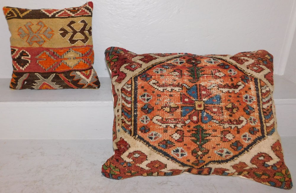 Two Antique Hand Made Rug Pillows: Two Antique Hand Made Rug Pillows . Up to 15 1/2" x 20 1/2" ALL DESCRIPTIONS AND ANY CONDITION STATEMENT GIVEN BY LANGSTON AUCTION GALLERY ARE STRICTLY OPINIONS AND LANGSTON'S SHALL HAVE NO