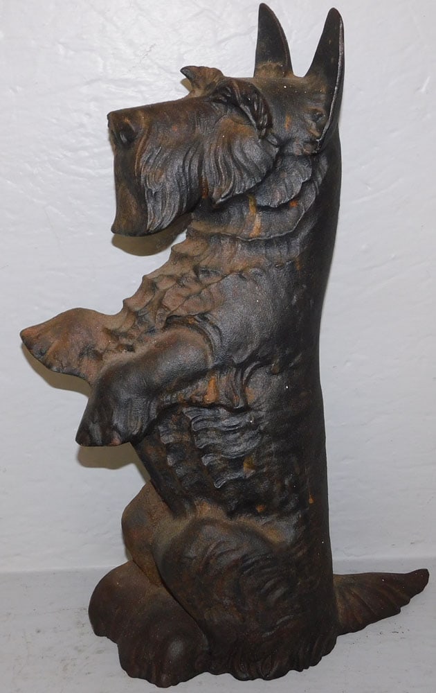 Antique Cast Iron Terrier Door Stop: Antique Cast Iron Terrier Door Stop . 16 1/2" H 10 1/4" W ALL DESCRIPTIONS AND ANY CONDITION STATEMENT GIVEN BY LANGSTON AUCTION GALLERY ARE STRICTLY OPINIONS AND LANGSTON'S SHALL HAVE NO RESPONSIBILI