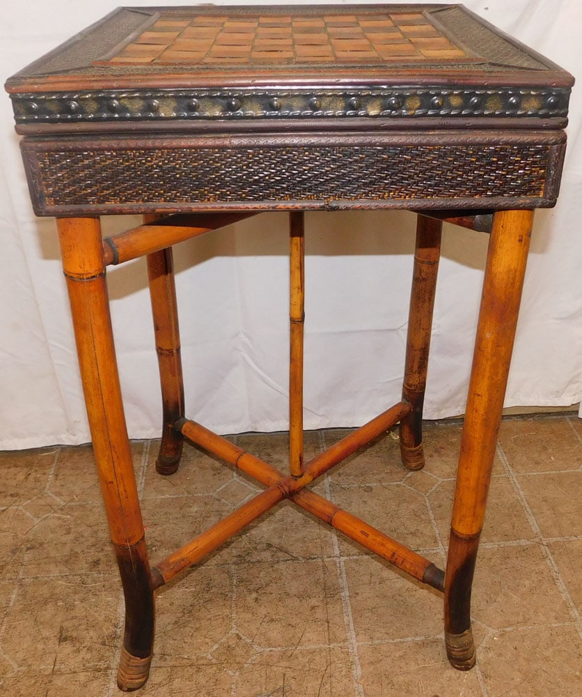 Lift Top Rattan & Bamboo Game Table with Chess Pieces: Lift Top Rattan & Bamboo Game Table with Chess Pieces . 28 1/4" H 17" W 60 3/4" D ALL DESCRIPTIONS AND ANY CONDITION STATEMENT GIVEN BY LANGSTON AUCTION GALLERY ARE STRICTLY OPINIONS AND LANGSTON'S