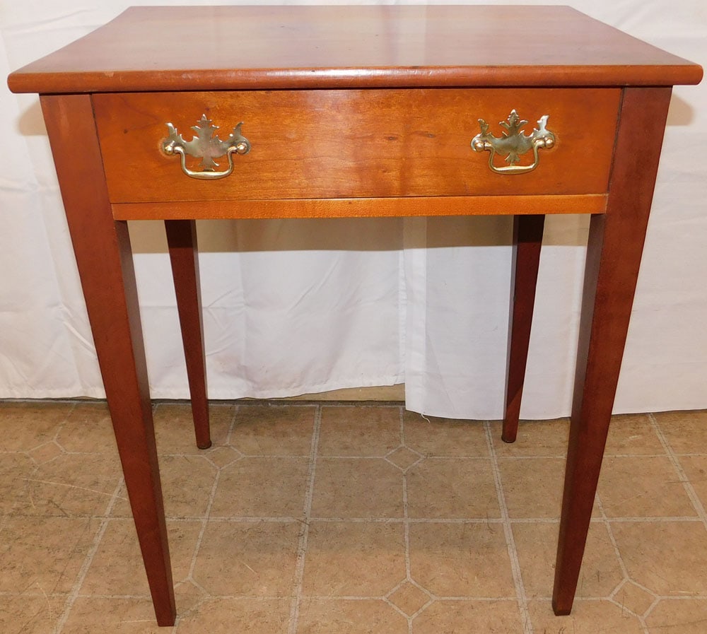 Bench Made Cherry Tapered Leg One Drawer Stand: Bench Made Cherry Tapered Leg One Drawer Stand . 27 3/4" H 23" W 17" D ALL DESCRIPTIONS AND ANY CONDITION STATEMENT GIVEN BY LANGSTON AUCTION GALLERY ARE STRICTLY OPINIONS AND LANGSTON'S SHALL HAVE NO