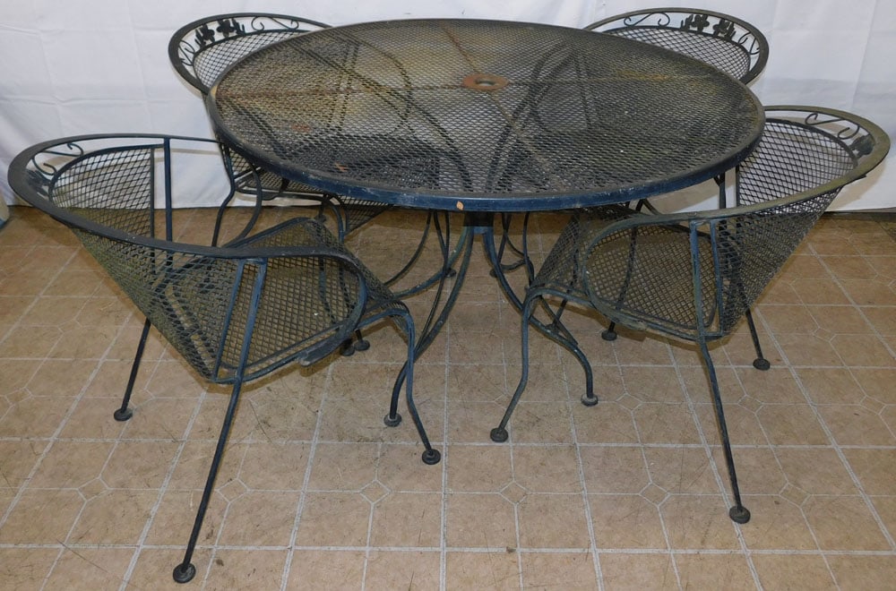 Five Piece Painted Wrought Iron Patio Set, (Table & Four Chairs): Five Piece Painted Wrought Iron Patio Set, (Table & Four Chairs). Table: 29" H 48" Dia. ALL DESCRIPTIONS AND ANY CONDITION STATEMENT GIVEN BY LANGSTON AUCTION GALLERY ARE STRICTLY OPINIONS AND LANGSTO