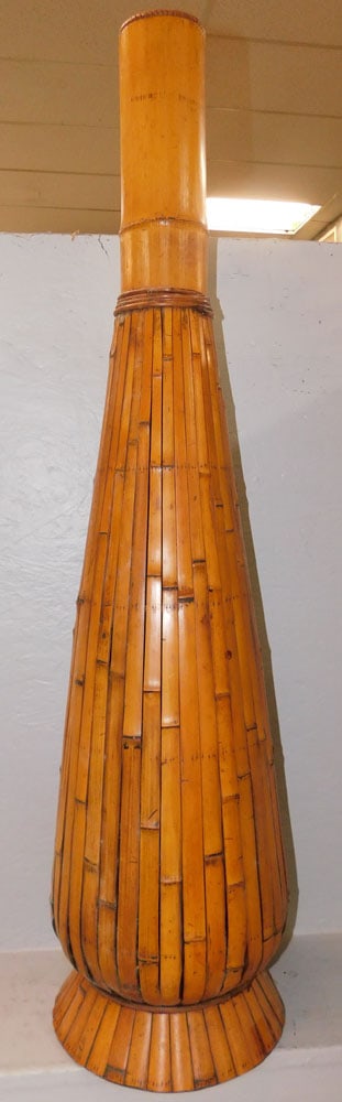 Bamboo Decorative Vase Form: Bamboo Decorative Vase Form . 45 1/2" H 11" Dia. ALL DESCRIPTIONS AND ANY CONDITION STATEMENT GIVEN BY LANGSTON AUCTION GALLERY ARE STRICTLY OPINIONS AND LANGSTON'S SHALL HAVE NO RESPONSIBILITY FOR