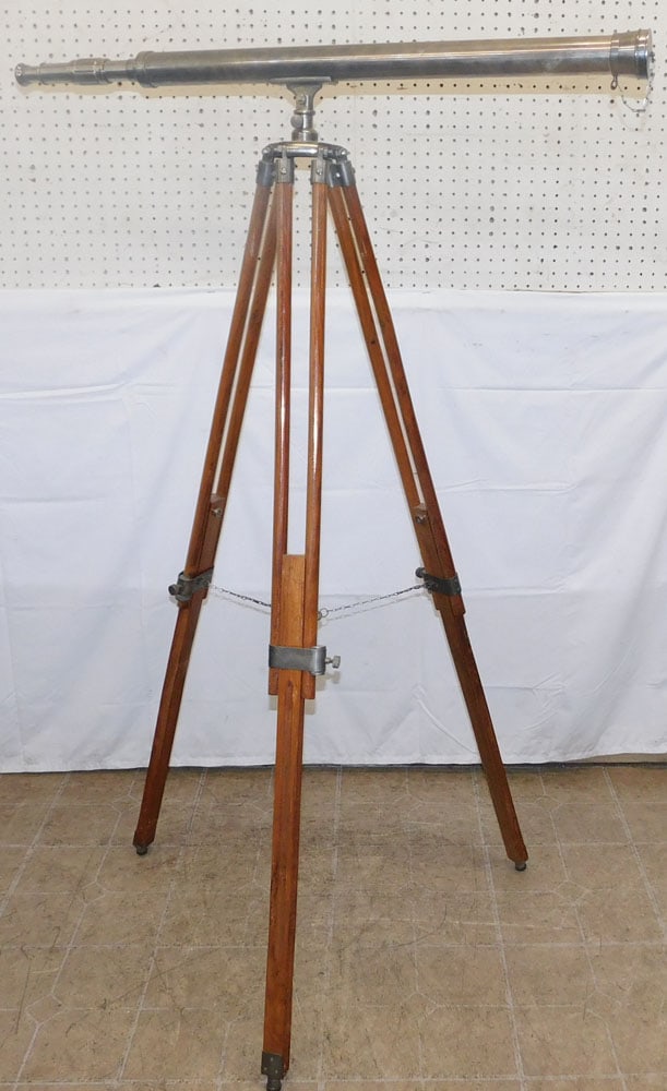 Silverplated & Teak Wood Telescope On Stand: Silverplated & Teak Wood Telescope On Stand . 60" H 39 1/4" L ALL DESCRIPTIONS AND ANY CONDITION STATEMENT GIVEN BY LANGSTON AUCTION GALLERY ARE STRICTLY OPINIONS AND LANGSTON'S SHALL HAVE NO