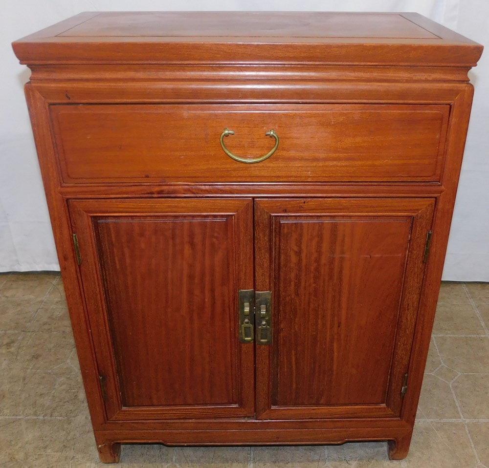 Oriental Teak Wood One Drawer Two Door Cabinet: Oriental Teak Wood One Drawer Two Door Cabinet . 31 1/4" H 24" W 14" D ALL DESCRIPTIONS AND ANY CONDITION STATEMENT GIVEN BY LANGSTON AUCTION GALLERY ARE STRICTLY OPINIONS AND LANGSTON'S SHALL HAVE