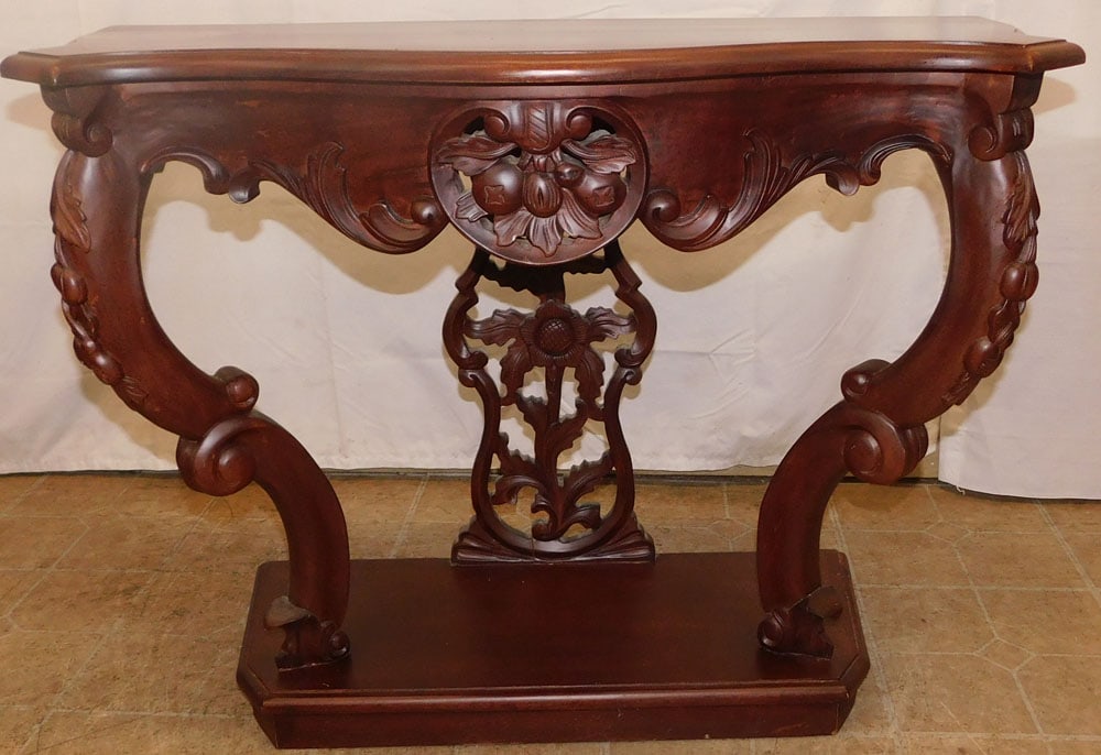 Carved Mahogany Console: Carved Mahogany Console . 27 1/2" H 36 1/2" W 15 1/4" D ALL DESCRIPTIONS AND ANY CONDITION STATEMENT GIVEN BY LANGSTON AUCTION GALLERY ARE STRICTLY OPINIONS AND LANGSTON'S SHALL HAVE NO