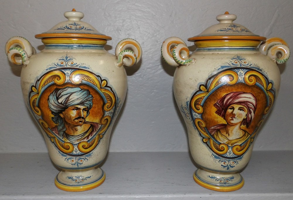 Pair of Porcelain Polychrome Decorated Covered Urns: Pair of Porcelain Polychrome Decorated Covered Urns . 13 1/2" x 9 3/4" Dia. ALL DESCRIPTIONS AND ANY CONDITION STATEMENT GIVEN BY LANGSTON AUCTION GALLERY ARE STRICTLY OPINIONS AND LANGSTON'S SHALL