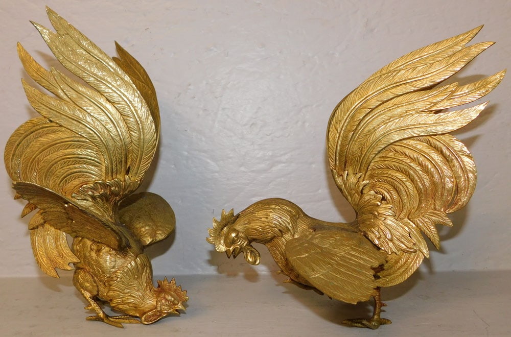 Two Brass Fighting Cock Form Figures: Two Brass Fighting Cock Form Figures. Up to 9" H 9" W ALL DESCRIPTIONS AND ANY CONDITION STATEMENT GIVEN BY LANGSTON AUCTION GALLERY ARE STRICTLY OPINIONS AND LANGSTON'S SHALL HAVE NO RESPONSIBILITY