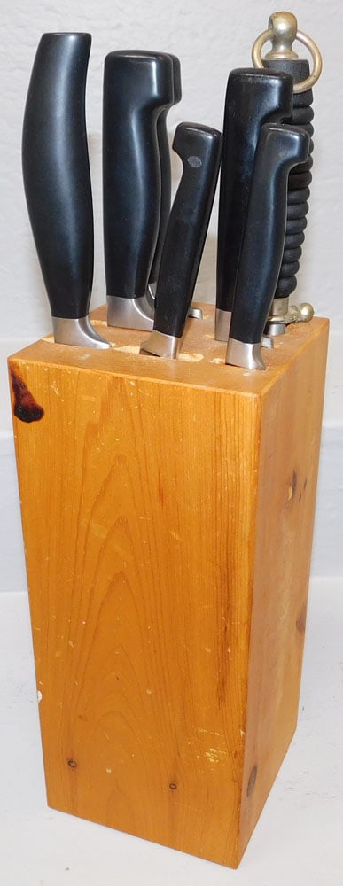 Set of J. A. Hinkle Knives in Pine Stand: Set of J. A. Hinkle Knives in Pine Stand. 17 1/4" H 5" Dia. ALL DESCRIPTIONS AND ANY CONDITION STATEMENT GIVEN BY LANGSTON AUCTION GALLERY ARE STRICTLY OPINIONS AND LANGSTON'S SHALL HAVE NO