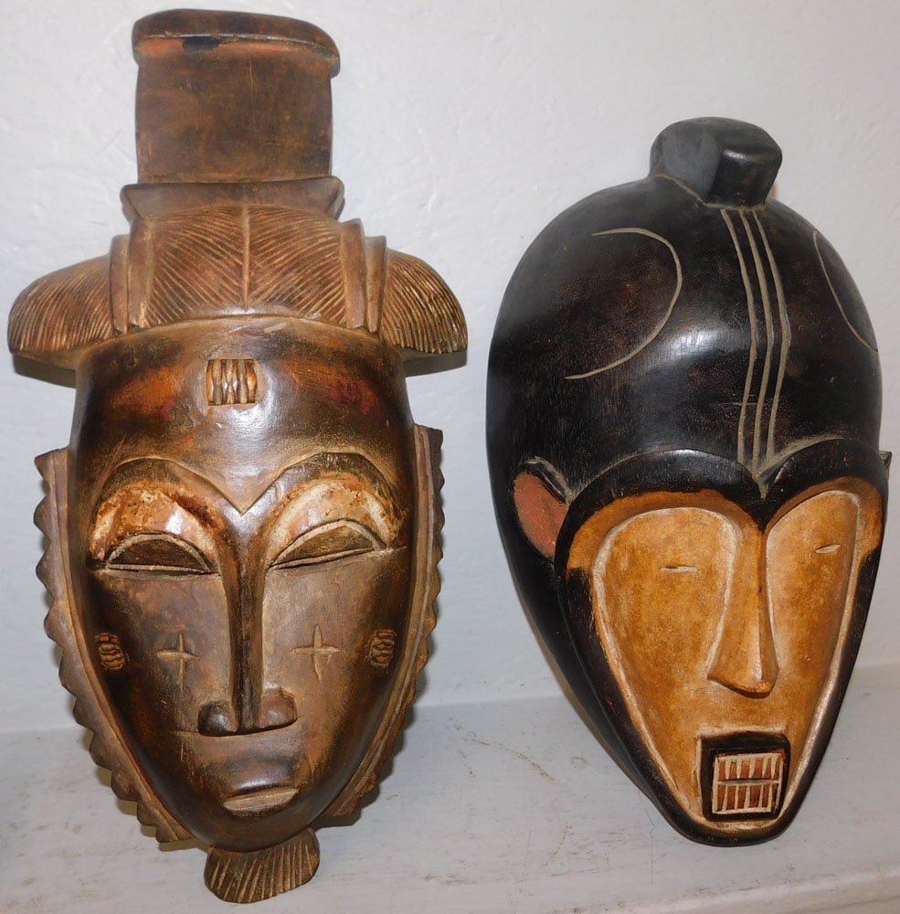 Two Carved Wood Masks: Two Carved Wood Masks . Up to 19 3/4" x 9 3/4" ALL DESCRIPTIONS AND ANY CONDITION STATEMENT GIVEN BY LANGSTON AUCTION GALLERY ARE STRICTLY OPINIONS AND LANGSTON'S SHALL HAVE NO RESPONSIBILITY FOR ERRO