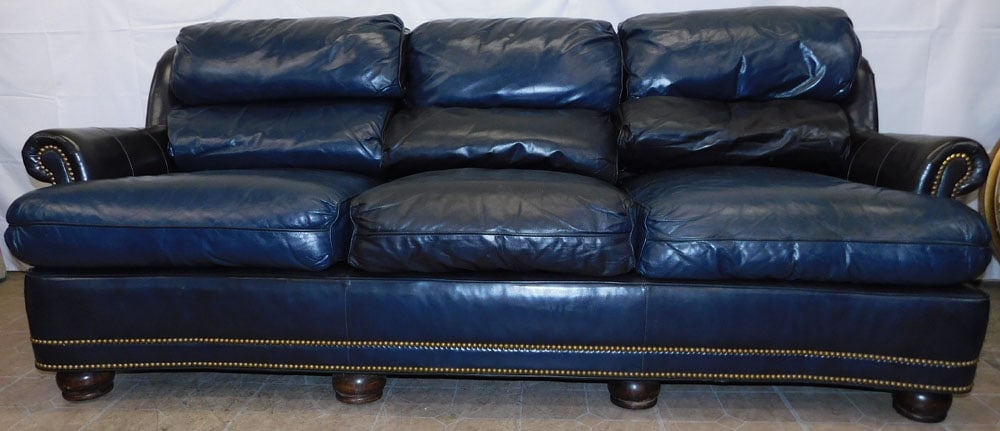 Leather Upholstered Sofa by Hancock & Moore: Leather Upholstered Sofa by Hancock & Moore. 34" H 85" W 40" D ALL DESCRIPTIONS AND ANY CONDITION STATEMENT GIVEN BY LANGSTON AUCTION GALLERY ARE STRICTLY OPINIONS AND LANGSTON'S SHALL HAVE NO RESPONS