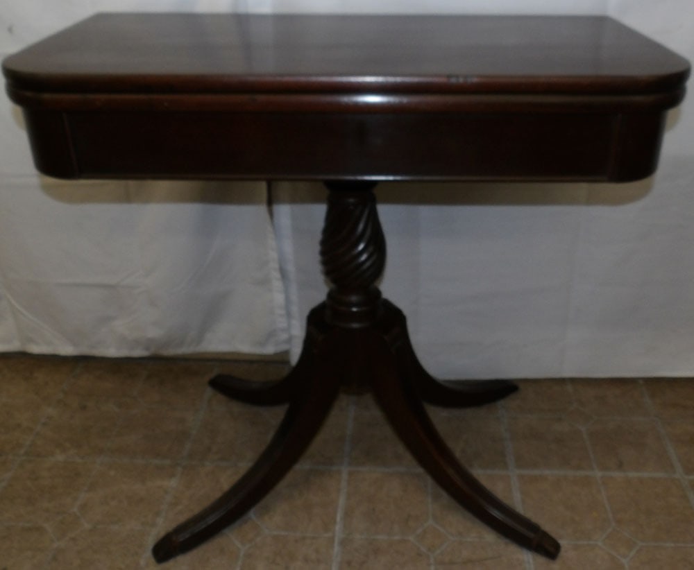 Mahogany Fold Over Top Game Table by Brandt: Mahogany Fold Over Top Game Table by Brandt. 29 1/2" H 32" W 16" D ALL DESCRIPTIONS AND ANY CONDITION STATEMENT GIVEN BY LANGSTON AUCTION GALLERY ARE STRICTLY OPINIONS AND LANGSTON'S SHALL HAVE NO RES