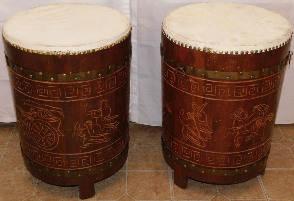 Pair of Animal Hyde Brass Bound Wood Drums: Pair of Animal Hyde Brass Bound Wood Drums. 21" H 15" Dia. ALL DESCRIPTIONS AND ANY CONDITION STATEMENT GIVEN BY LANGSTON AUCTION GALLERY ARE STRICTLY OPINIONS AND LANGSTON'S SHALL HAVE NO RESPONSIBIL