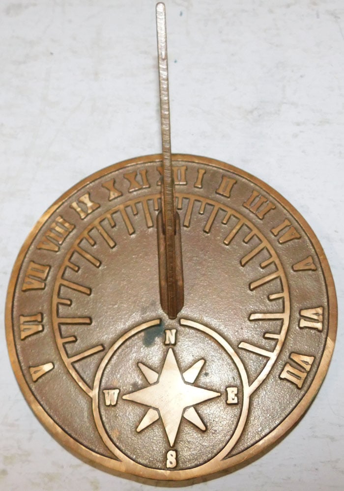 Bronze Sun Dial by American Sun Dial Inc.: Bronze Sun Dial by American Sun Dial Inc. . 4 1/4" H 7 3/4" Dia. ALL DESCRIPTIONS AND ANY CONDITION STATEMENT GIVEN BY LANGSTON AUCTION GALLERY ARE STRICTLY OPINIONS AND LANGSTON'S SHALL HAVE NO