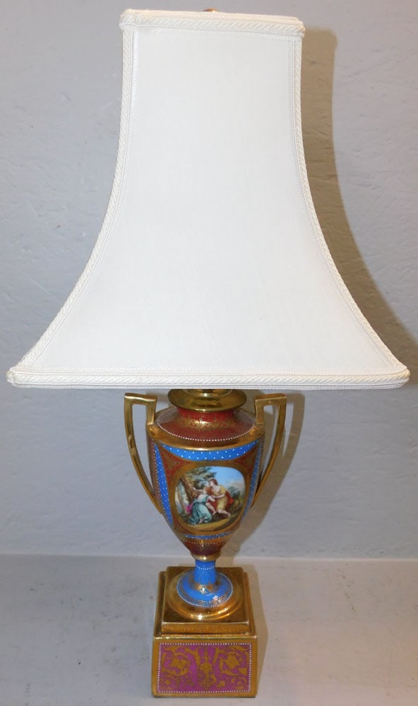 Painted Porcelain Urn Made Into Lamp: Painted Porcelain Urn Made Into Lamp . 23" H 10 1/2" Dia. ALL DESCRIPTIONS AND ANY CONDITION STATEMENT GIVEN BY LANGSTON AUCTION GALLERY ARE STRICTLY OPINIONS AND LANGSTON'S SHALL HAVE NO RESPONSIBILI