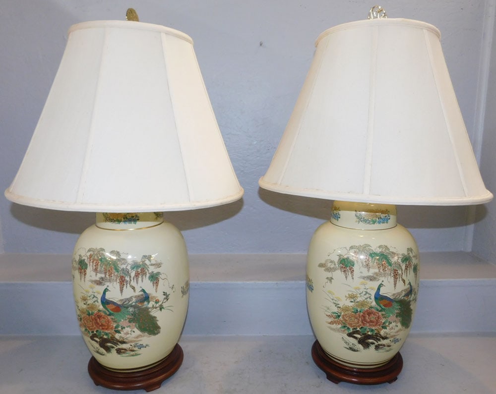 Pair of Painted Porcelain Oriental Urns Made Into Lamps with Peacock Motif: Pair of Painted Porcelain Oriental Urns Made Into Lamps with Peacock Motif . 30 1/2" H 18" Dia. ALL DESCRIPTIONS AND ANY CONDITION STATEMENT GIVEN BY LANGSTON AUCTION GALLERY ARE STRICTLY OPINIONS AND