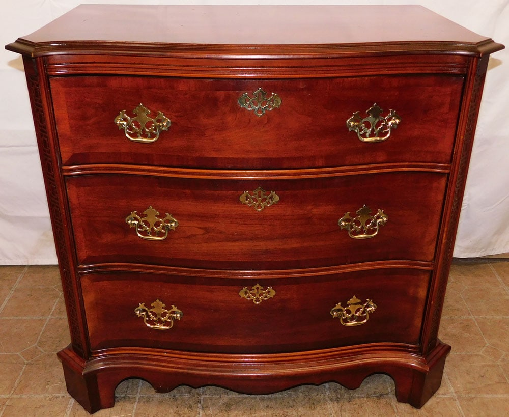 Cherry Serpentine Front Three Drawer Chest by Bassett: Cherry Serpentine Front Three Drawer Chest by Bassett. 33" H 35" W 19 1/2" D ALL DESCRIPTIONS AND ANY CONDITION STATEMENT GIVEN BY LANGSTON AUCTION GALLERY ARE STRICTLY OPINIONS AND LANGSTON'S SHALL H