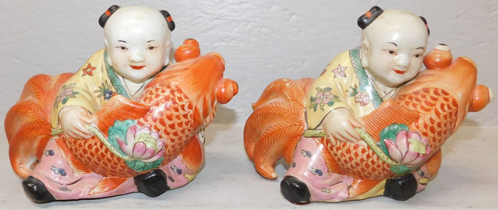 Pair of Oriental Porcelain Figures of Young Girl Holding Koi: Pair of Oriental Porcelain Figures of Young Girl Holding Koi . 6 1/4" H 8 1/4" W 4 1/2" D ALL DESCRIPTIONS AND ANY CONDITION STATEMENT GIVEN BY LANGSTON AUCTION GALLERY ARE STRICTLY OPINIONS AND LANGS