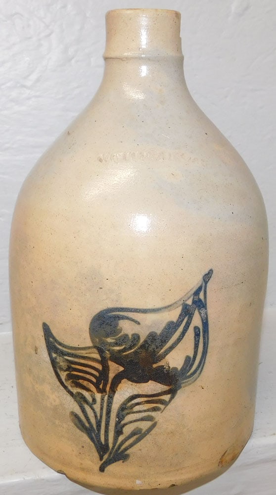Antique Blue Decorated Stoneware Whisky Jug: Antique Blue Decorated Stoneware Whisky Jug. 11 1/2" H 7 1/2" W ALL DESCRIPTIONS AND ANY CONDITION STATEMENT GIVEN BY LANGSTON AUCTION GALLERY ARE STRICTLY OPINIONS AND LANGSTON'S SHALL HAVE NO