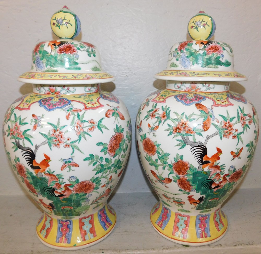 Pair of Painted Porcelain Oriental Covered Urns with Butterfly Motif: Pair of Painted Porcelain Oriental Covered Urns with Butterfly Motif. 18" H 10" Dia. ALL DESCRIPTIONS AND ANY CONDITION STATEMENT GIVEN BY LANGSTON AUCTION GALLERY ARE STRICTLY OPINIONS AND LANGSTON'S
