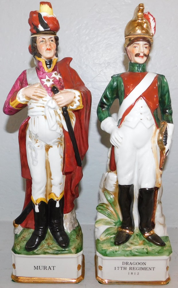 Pair of Painted Porcelain Soldier Figure Decanters: Pair of Painted Porcelain Soldier Figure Decanters. 14" H 4 1/2 W ALL DESCRIPTIONS AND ANY CONDITION STATEMENT GIVEN BY LANGSTON AUCTION GALLERY ARE STRICTLY OPINIONS AND LANGSTON'S SHALL HAVE NO RESP