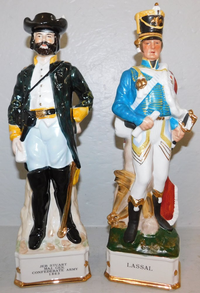 Pair of Painted Porcelain Soldier Figure Decanters: Pair of Painted Porcelain Soldier Figure Decanters. 14" H 4 1/2 W ALL DESCRIPTIONS AND ANY CONDITION STATEMENT GIVEN BY LANGSTON AUCTION GALLERY ARE STRICTLY OPINIONS AND LANGSTON'S SHALL HAVE NO RESP