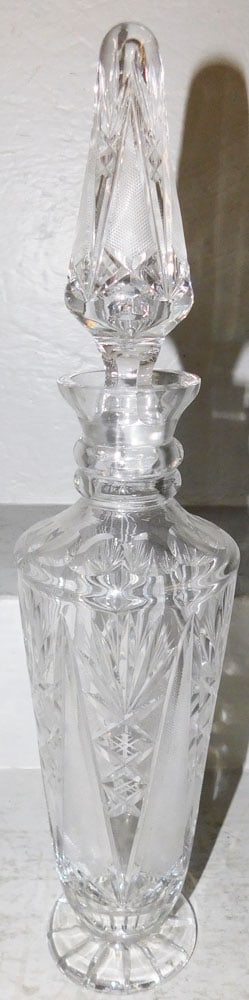 Cut Glass Decanter: Cut Glass Decanter . 18 3/4" H 4 1/4" Dia. ALL DESCRIPTIONS AND ANY CONDITION STATEMENT GIVEN BY LANGSTON AUCTION GALLERY ARE STRICTLY OPINIONS AND LANGSTON'S SHALL HAVE NO RESPONSIBILITY FOR ERRORS O
