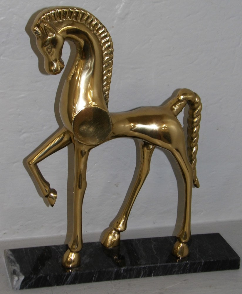 Mid Century Modern Cast Brass Trotting Horse Statue on Marble Base: Mid Century Modern Cast Brass Trotting Horse Statue on Marble Base. 13 1/2" H 12" W 3" D ALL DESCRIPTIONS AND ANY CONDITION STATEMENT GIVEN BY LANGSTON AUCTION GALLERY ARE STRICTLY OPINIONS AND LANGST