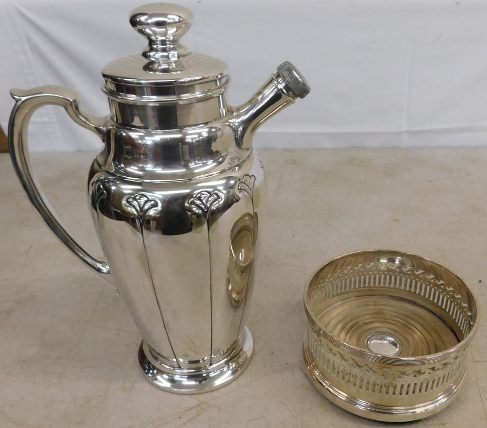 Silverplated Cocktail Mixer & Wine Coaster: Silverplated Cocktail Mixer & Wine Coaster . Up to 10 1/2" H 7 1/2" W ALL DESCRIPTIONS AND ANY CONDITION STATEMENT GIVEN BY LANGSTON AUCTION GALLERY ARE STRICTLY OPINIONS AND LANGSTON'S SHALL HAVE NO 