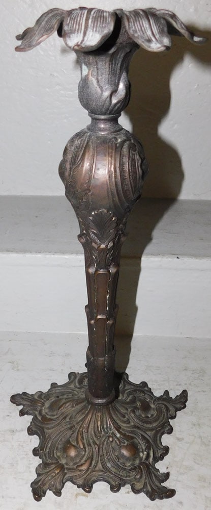 Ornate Cast Bronze Candlestick: Ornate Cast Bronze Candlestick . 19" H 9 3/4" Dia. ALL DESCRIPTIONS AND ANY CONDITION STATEMENT GIVEN BY LANGSTON AUCTION GALLERY ARE STRICTLY OPINIONS AND LANGSTON'S SHALL HAVE NO RESPONSIBILITY FOR 