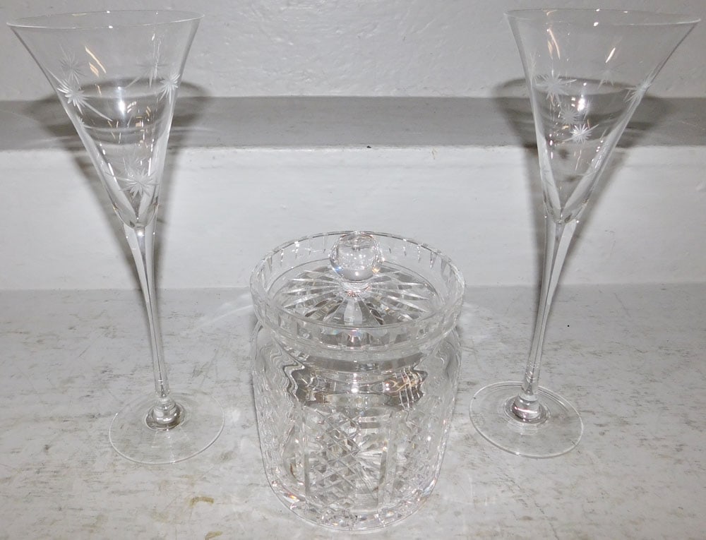 Two Waterford Crystal Wine Glasses & Biscuit Jar: Two Waterford Crystal Wine Glasses & Biscuit Jar. Up to 11 1/4" H 4" Dia. ALL DESCRIPTIONS AND ANY CONDITION STATEMENT GIVEN BY LANGSTON AUCTION GALLERY ARE STRICTLY OPINIONS AND LANGSTON'S SHALL