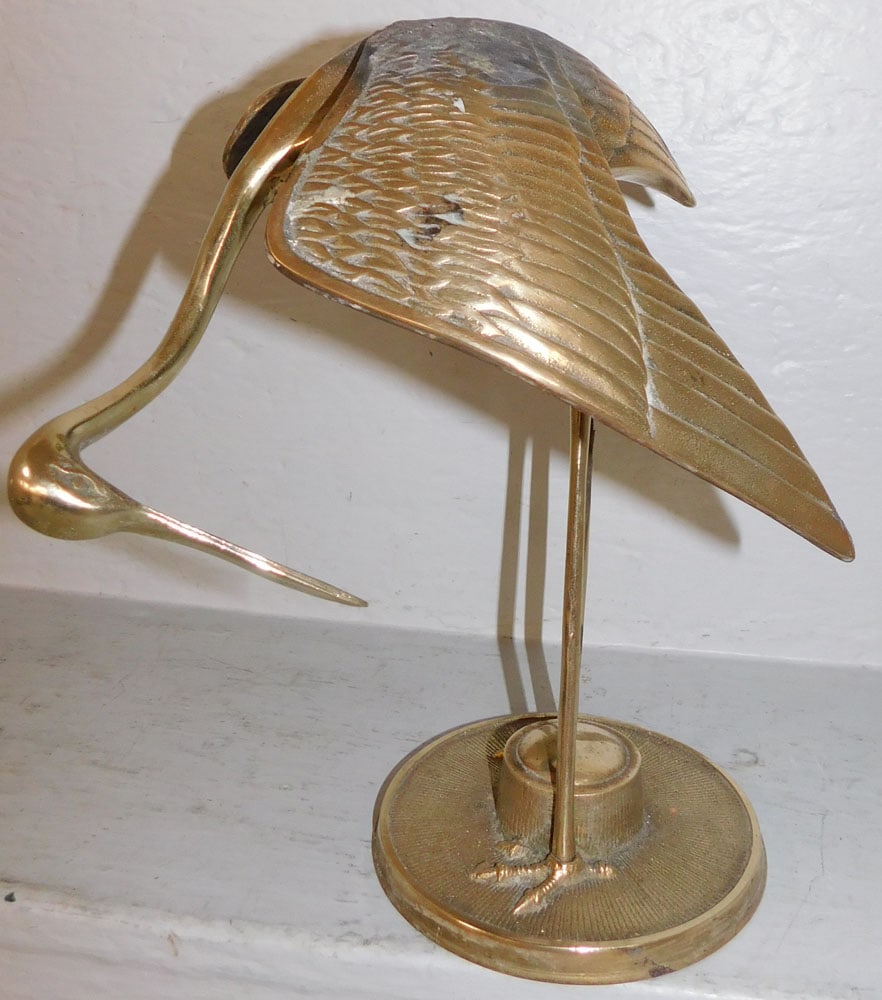 Brass Heron Figure: Brass Heron Figure . 12" H 10" W ALL DESCRIPTIONS AND ANY CONDITION STATEMENT GIVEN BY LANGSTON AUCTION GALLERY ARE STRICTLY OPINIONS AND LANGSTON'S SHALL HAVE NO RESPONSIBILITY FOR ERRORS OR OMISSION
