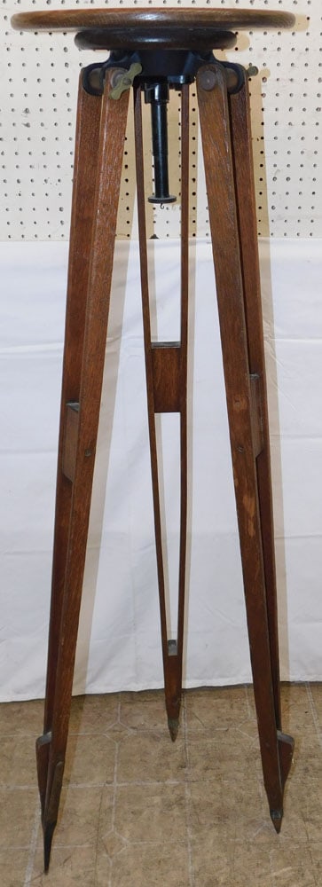 Oak Tripod Fern Stand: Oak Tripod Fern Stand . 57 1/2" H 15" Dia. ALL DESCRIPTIONS AND ANY CONDITION STATEMENT GIVEN BY LANGSTON AUCTION GALLERY ARE STRICTLY OPINIONS AND LANGSTON'S SHALL HAVE NO RESPONSIBILITY FOR ERRORS