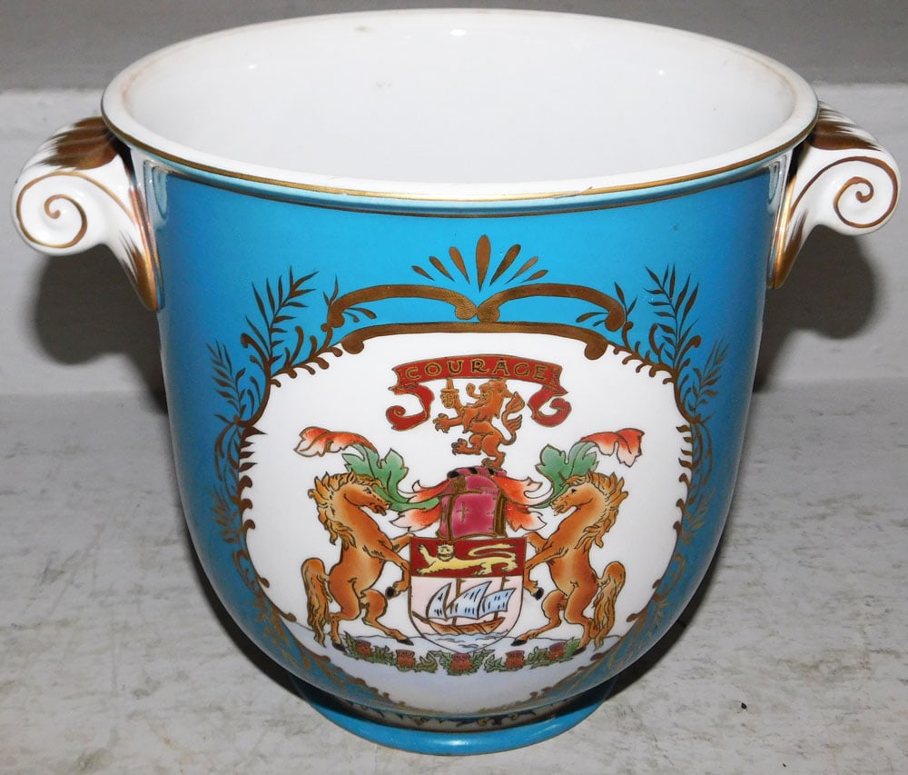 Painted Porcelain Cache Pot with Armorial Motif: Painted Porcelain Cache Pot with Armorial Motif . 8" H 9 3/4" W ALL DESCRIPTIONS AND ANY CONDITION STATEMENT GIVEN BY LANGSTON AUCTION GALLERY ARE STRICTLY OPINIONS AND LANGSTON'S SHALL HAVE NO