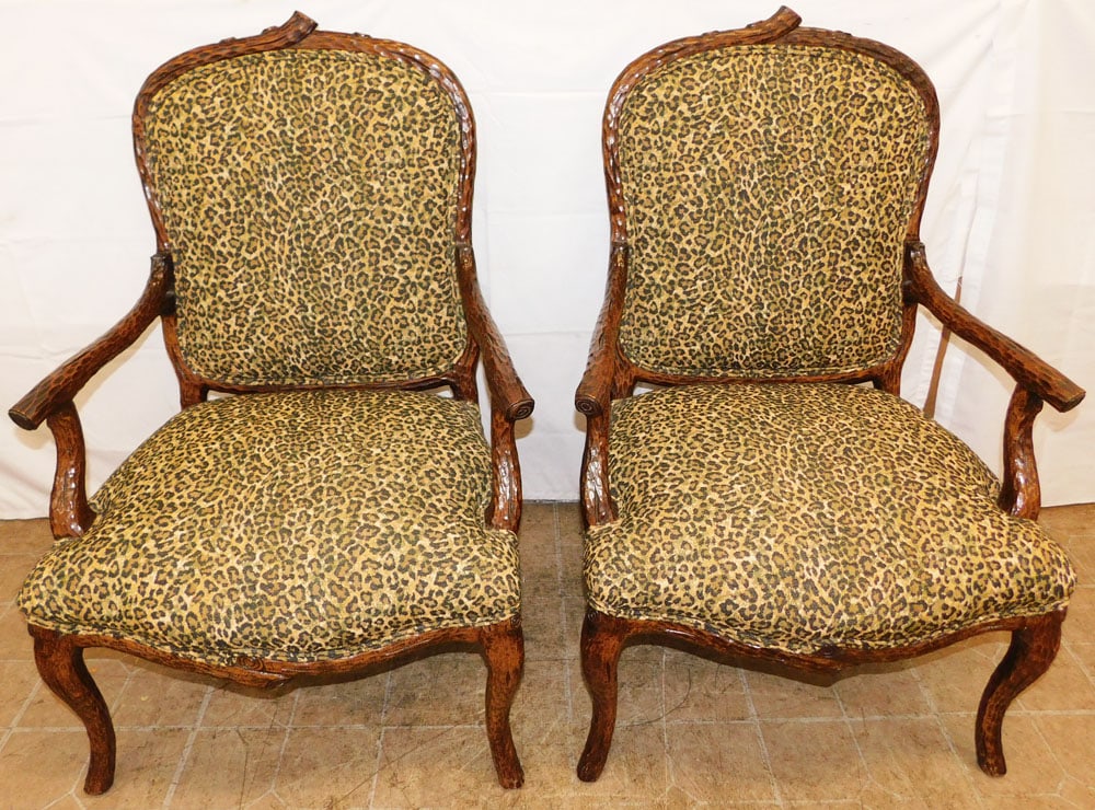 Pair of Carved Wood & Upholstered Arm Chairs: Pair of Carved Wood & Upholstered Arm Chairs . 40 3/4" H 27 1/2" W 24" D ALL DESCRIPTIONS AND ANY CONDITION STATEMENT GIVEN BY LANGSTON AUCTION GALLERY ARE STRICTLY OPINIONS AND LANGSTON'S SHALL HAVE
