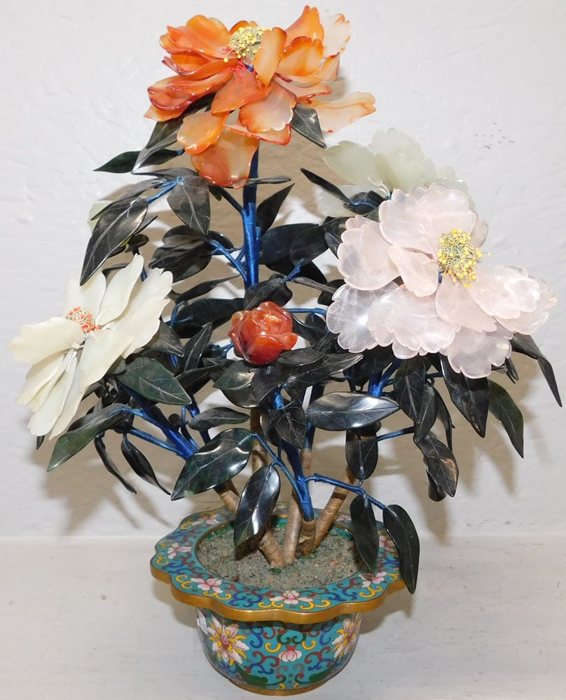 Oriental Jade Stone Floral Plant in Cloisonne Planter: Oriental Jade Stone Floral Plant in Cloisonne Planter . 14 1/2" H 11 1/2" Dia. ALL DESCRIPTIONS AND ANY CONDITION STATEMENT GIVEN BY LANGSTON AUCTION GALLERY ARE STRICTLY OPINIONS AND LANGSTON'S