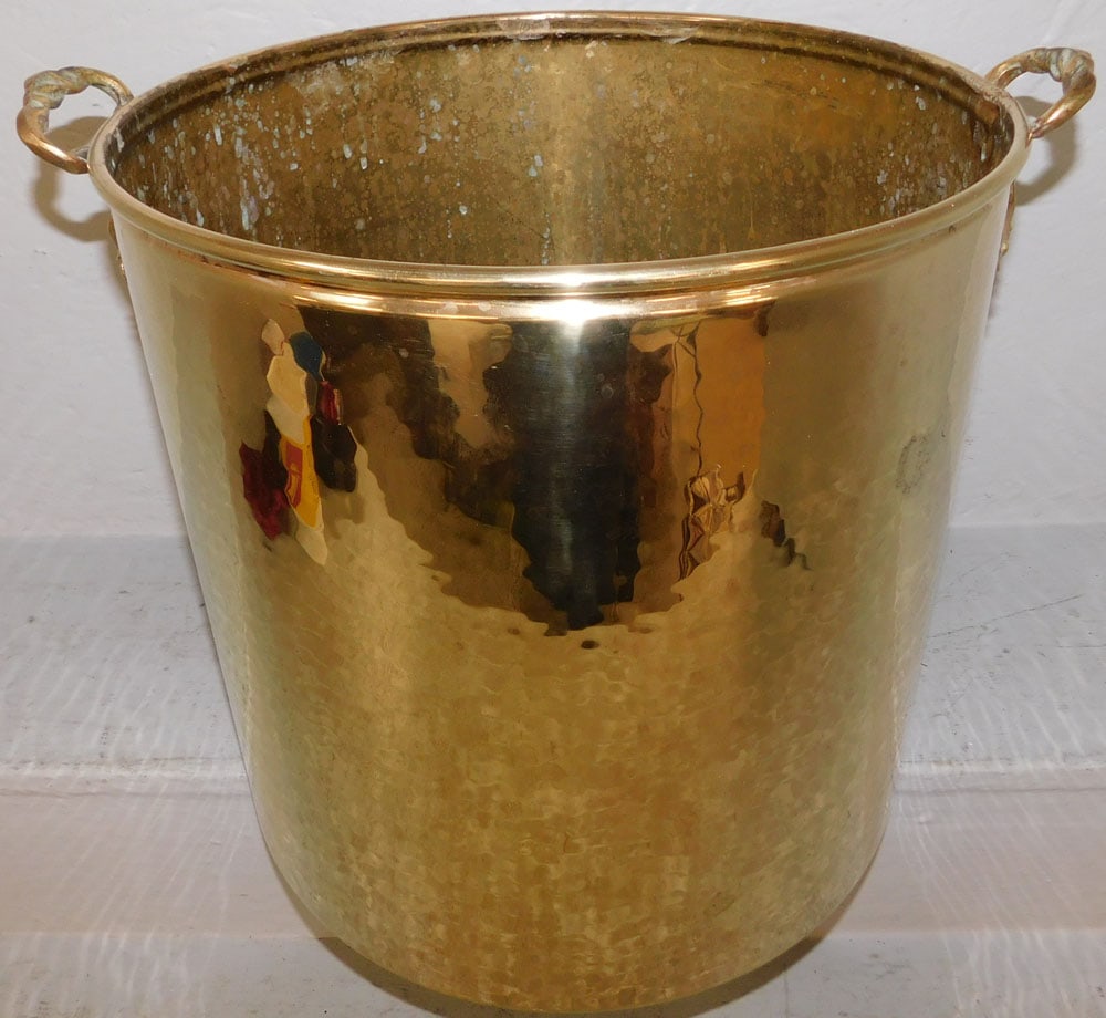 Two Handled Polished Hammered Brass Jardiniere: Two Handled Polished Hammered Brass Jardiniere . 15" H 17 1/2" W ALL DESCRIPTIONS AND ANY CONDITION STATEMENT GIVEN BY LANGSTON AUCTION GALLERY ARE STRICTLY OPINIONS AND LANGSTON'S SHALL HAVE NO