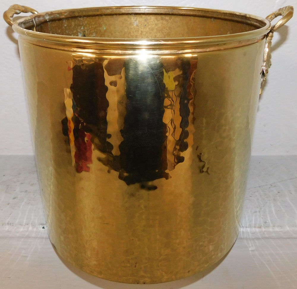 Two Handled Polished Hammered Brass Jardiniere: Two Handled Polished Hammered Brass Jardiniere . 13" H 15 1/2" W ALL DESCRIPTIONS AND ANY CONDITION STATEMENT GIVEN BY LANGSTON AUCTION GALLERY ARE STRICTLY OPINIONS AND LANGSTON'S SHALL HAVE NO