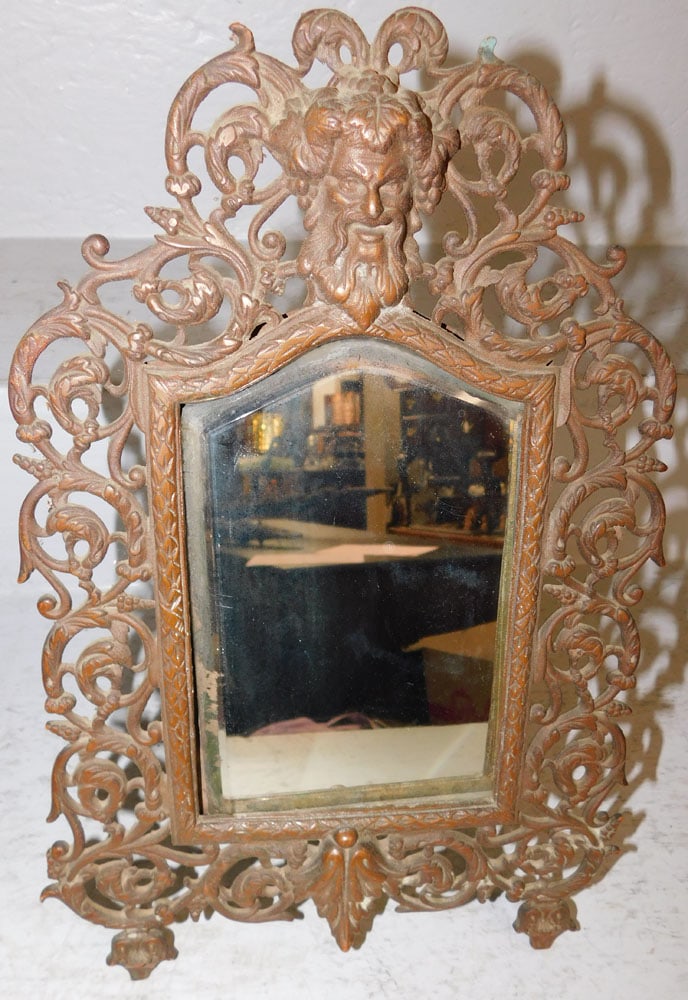 Antique Ornate Brass Open Work Frame Bevel Edge Mirror: Antique Ornate Brass Open Work Frame Bevel Edge Mirror. 14 1/2" x 10" ALL DESCRIPTIONS AND ANY CONDITION STATEMENT GIVEN BY LANGSTON AUCTION GALLERY ARE STRICTLY OPINIONS AND LANGSTON'S SHALL HAVE NO