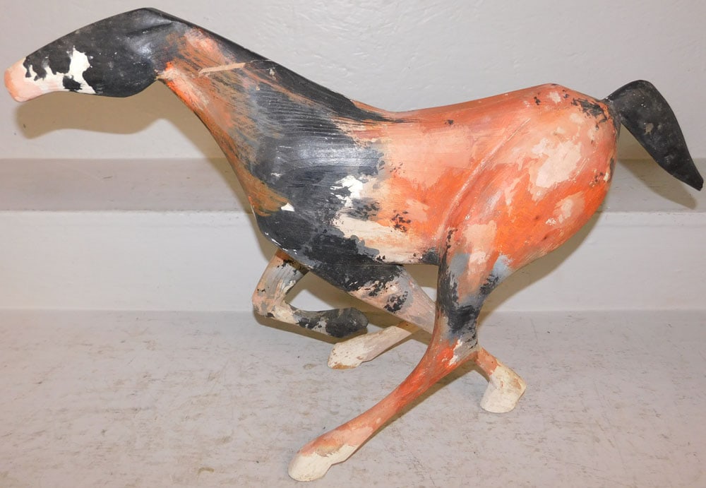 Painted Carved Pine Horse Statue: Painted Carved Pine Horse Statue. 16 1/2" H 26 1/2" W ALL DESCRIPTIONS AND ANY CONDITION STATEMENT GIVEN BY LANGSTON AUCTION GALLERY ARE STRICTLY OPINIONS AND LANGSTON'S SHALL HAVE NO RESPONSIBILITY