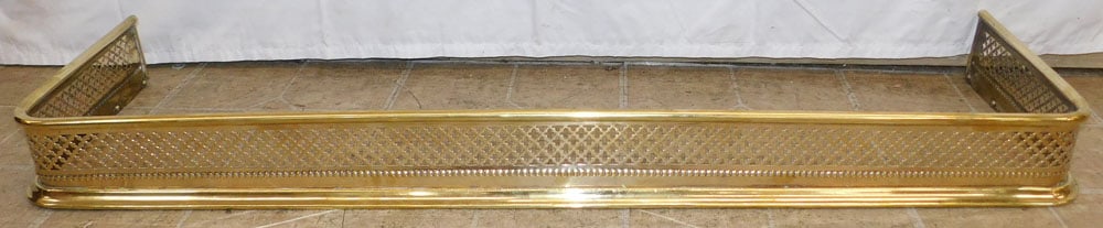 Antique Brass Open Work Fireplace Fender: Antique Brass Open Work Fireplace Fender . 4 1/4" H 45 1/2" W 12 1/4" D ALL DESCRIPTIONS AND ANY CONDITION STATEMENT GIVEN BY LANGSTON AUCTION GALLERY ARE STRICTLY OPINIONS AND LANGSTON'S SHALL HAVE