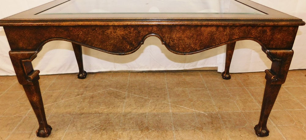 Faux Painted Tortoise & Glass Top Cocktail Table with Greek Key Motif: Faux Painted Tortoise & Glass Top Cocktail Table with Greek Key Motif. 25 1/2" H 50" W 30" D ALL DESCRIPTIONS AND ANY CONDITION STATEMENT GIVEN BY LANGSTON AUCTION GALLERY ARE STRICTLY OPINIONS AND LA