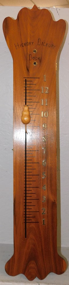 Bench Made Walnut Hickory Dickory Dock Wall Clock: Bench Made Walnut Hickory Dickory Dock Wall Clock. 36 3/4" H 8 1/2" W 4 1/2" D ALL DESCRIPTIONS AND ANY CONDITION STATEMENT GIVEN BY LANGSTON AUCTION GALLERY ARE STRICTLY OPINIONS AND LANGSTON'S SHALL